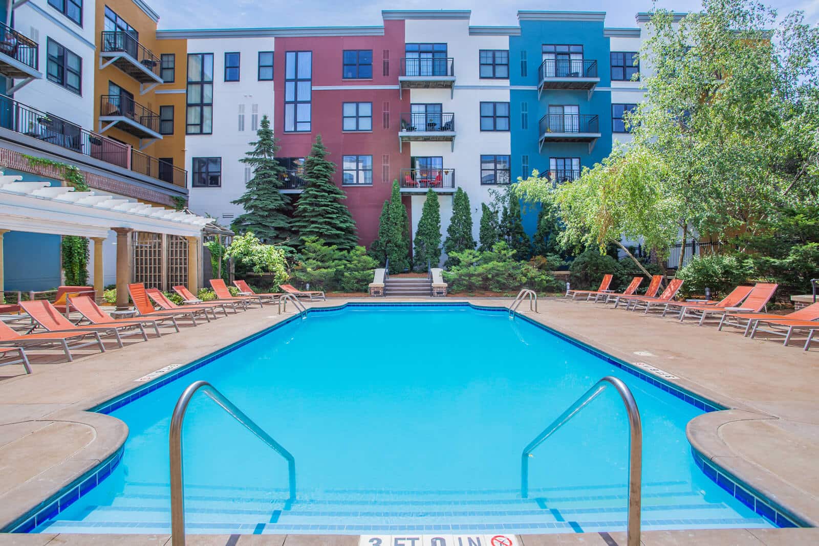 Relax poolside at Excelsior and Grand apartments in St Louis Park.